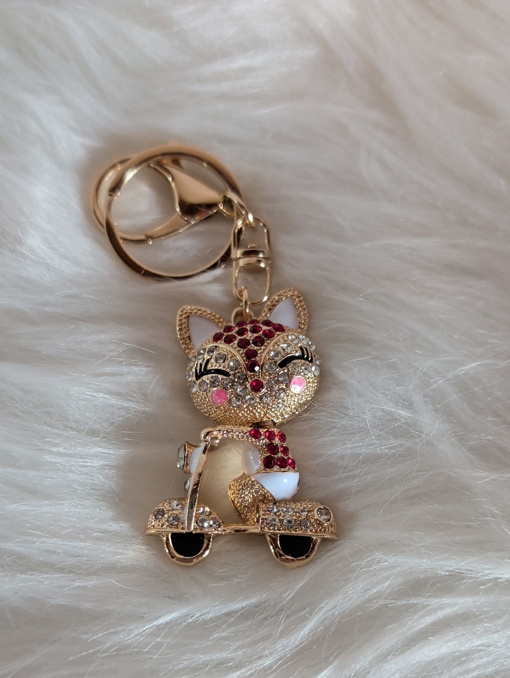 Gold-tone Kitty Scooter Keychain with Pink and White Accents